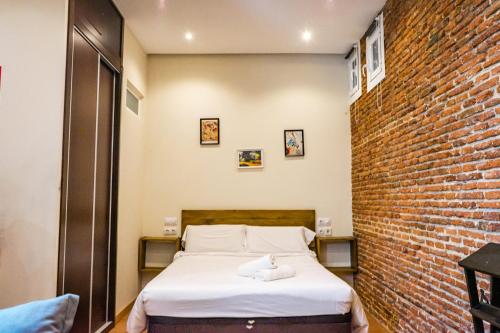 Postel nebo postele na pokoji v ubytování Acogedor estudio en Cuatro Caminos by beBalmy