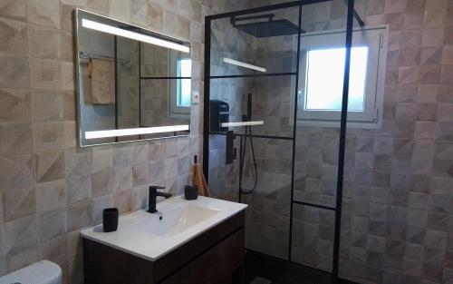 a bathroom with a sink and a shower at Mountain View in Alvor