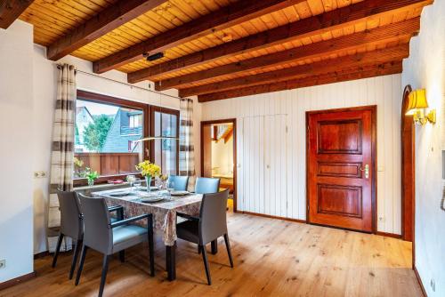 a dining room with a table and chairs at Cheng in Baden-Baden