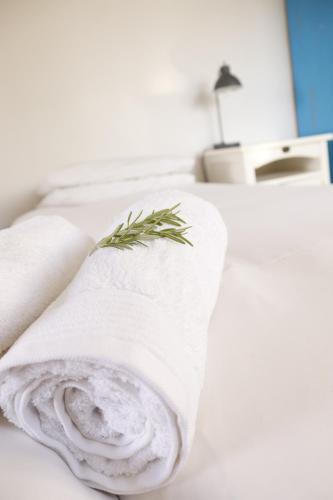 Postel nebo postele na pokoji v ubytování Pepper Tree Guesthouse