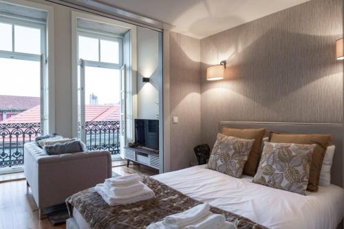 Postel nebo postele na pokoji v ubytování Luxury House Downtown Porto