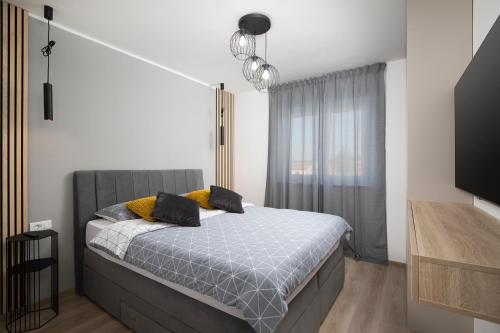 Postel nebo postele na pokoji v ubytování Meraviglia residence