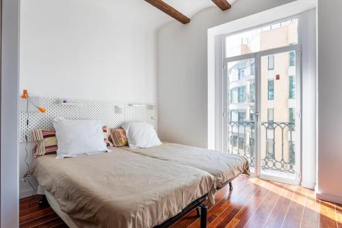 Postel nebo postele na pokoji v ubytování 7P céntrico piso con encanto