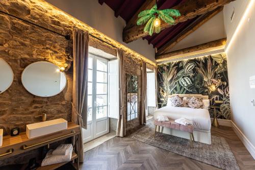 Posteľ alebo postele v izbe v ubytovaní Hospedium Hotel Barómetro de Camariñas