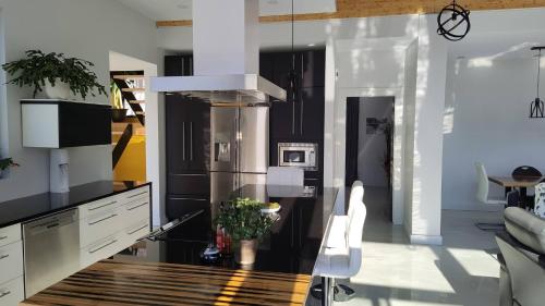 Kuchyň nebo kuchyňský kout v ubytování Magnifique Chalet En Montagne