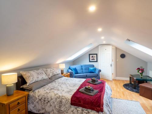 Postel nebo postele na pokoji v ubytování Cloonan House