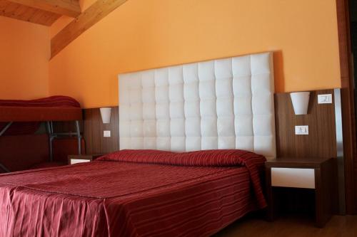 Postel nebo postele na pokoji v ubytování Hotel Vienna