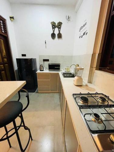 Una cocina o zona de cocina en sunset villa
