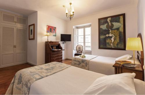 Art Boutique Hotel Chamarelにあるベッド