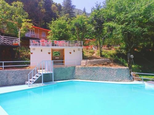 Aamod at Shoghi Luxury Cottage Resort