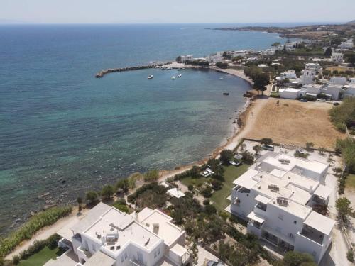 an aerial view of a beach with white houses at Kleanthi Apartments in Drios