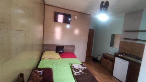 Postel nebo postele na pokoji v ubytování Sobe Che