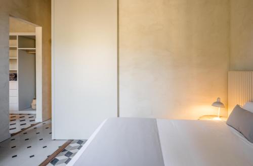 Ένα ή περισσότερα κρεβάτια σε δωμάτιο στο Casa Fàbregas - Benestar Natural