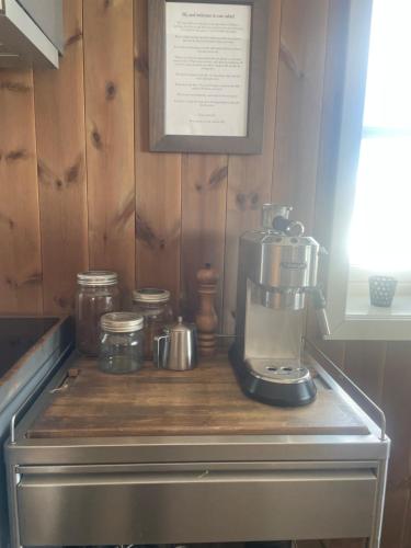 a coffee maker sitting on top of a counter at Norefjell Panorama in Noresund