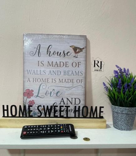 a house is made of walks and beams a home is made of love and home at Minimalist Cozy Home (RJ Prima 2 - UniSZA, UMT) in Kuala Terengganu