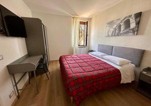 Postel nebo postele na pokoji v ubytování Sulla Ciclabile Apartment lungo il fiume Adige