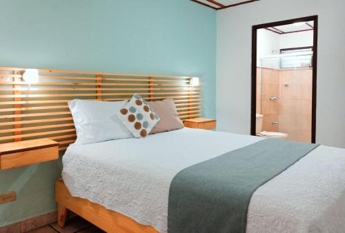 Postel nebo postele na pokoji v ubytování Trebol Amarillo Bed & Breakfast