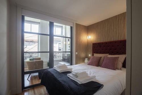 Giường trong phòng chung tại Fashion Luxury House