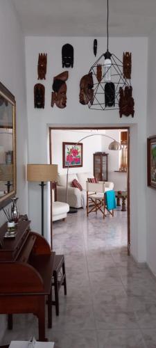 a living room with a couch and a table at Casa Las Gayarminas in Gáldar