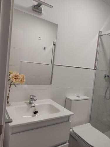 Ett badrum på Apartamentos BARBAS