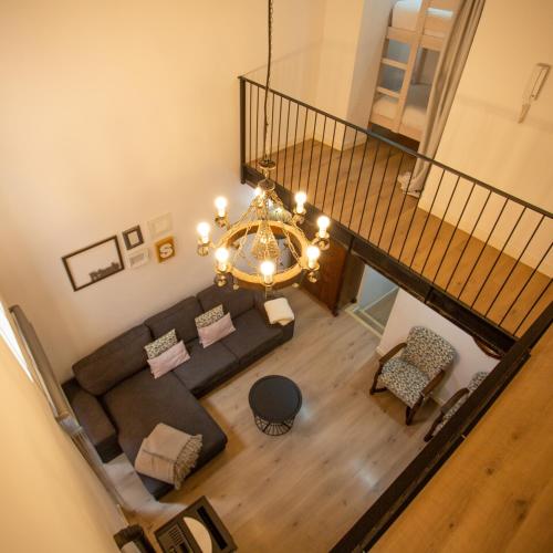 an overhead view of a living room with a couch and chair at Casa Severina in Alcoy