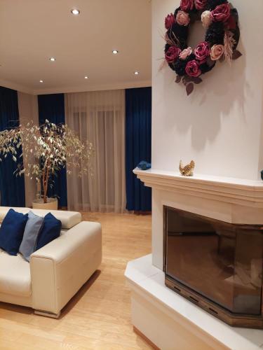 Ruang duduk di Villa pod Szczeblem Dom dla 12 osób z kominkiem balią jacuzzi