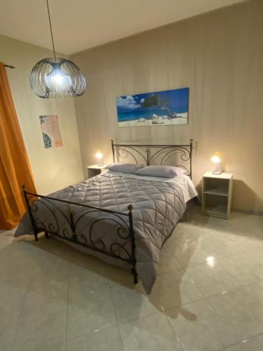 Tempat tidur dalam kamar di Al Poggio Della Macchia