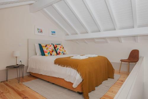 Postelja oz. postelje v sobi nastanitve Oporto Artist´s Loft