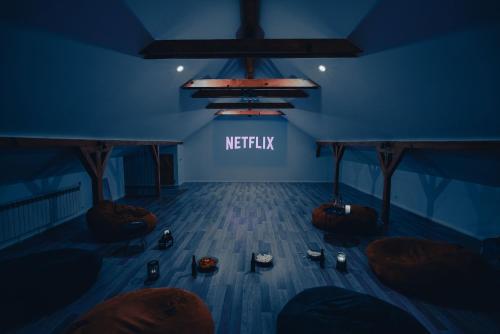 a blue room with shoes on the floor at StockEstate Moieciu in Moieciu de Jos