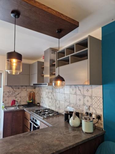 Кухня или мини-кухня в The Clover
