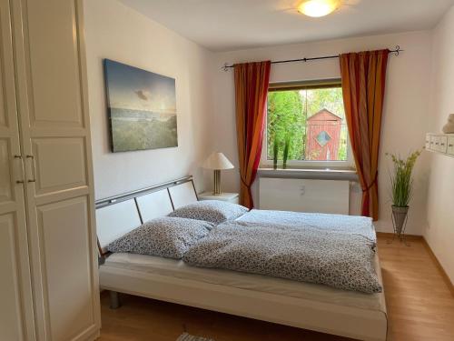 Postel nebo postele na pokoji v ubytování Ostsee-Ferienwohnung-Lipsia