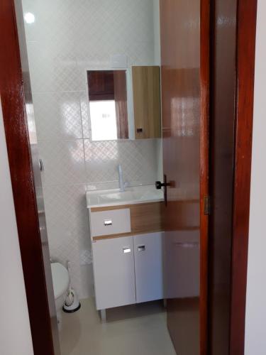 Koupelna v ubytování Apartamento Mari em Capão da Canoa RS