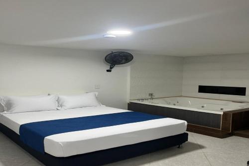 Cama o camas de una habitación en Hotel Jerusalen Estadio