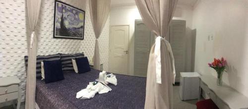 Relais de Charme Boutique Hotel Pititingaにあるベッド
