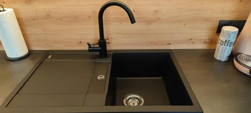 A kitchen or kitchenette at Appartement Waldzauber