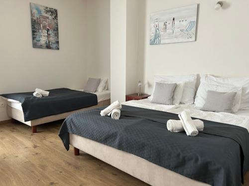 מיטה או מיטות בחדר ב-Apartman Valtice