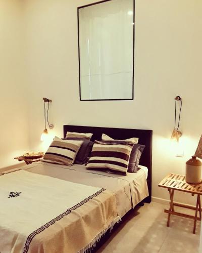 Katil atau katil-katil dalam bilik di Fra Cielo e Mare Boutique Rooms