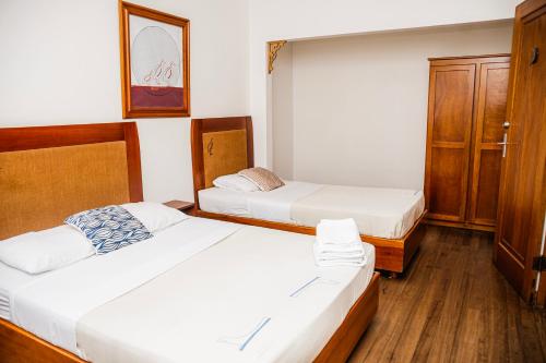 Postel nebo postele na pokoji v ubytování Hotel Luz de Luna