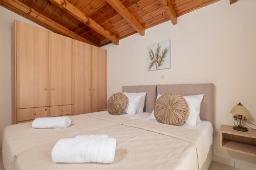Ένα ή περισσότερα κρεβάτια σε δωμάτιο στο Villa Pergola
