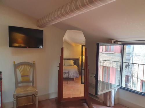 Postel nebo postele na pokoji v ubytování La petite hostellerie