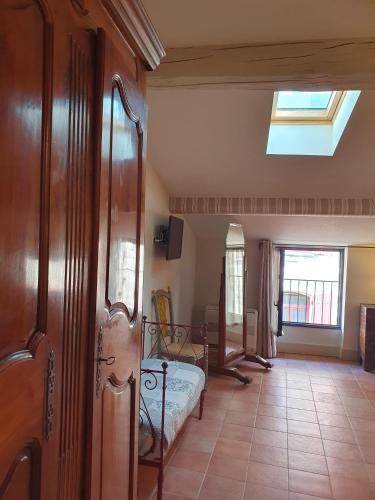 Postel nebo postele na pokoji v ubytování La petite hostellerie