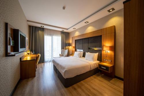 Ένα ή περισσότερα κρεβάτια σε δωμάτιο στο Holiday Inn - Trabzon-East by IHG