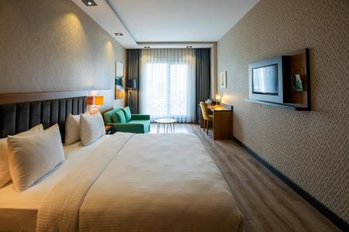 Ένα ή περισσότερα κρεβάτια σε δωμάτιο στο Holiday Inn - Trabzon-East by IHG