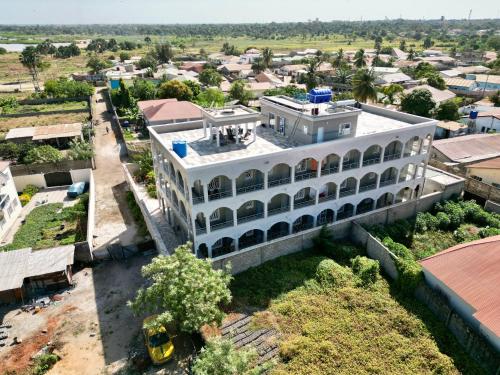 an aerial view of a building in a city at Babhilds Residence in Bakau