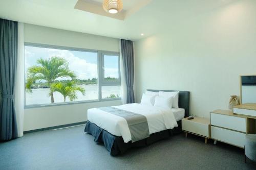 Postel nebo postele na pokoji v ubytování Cube9 Resort & Spa 큐브9 리조트 & 스파