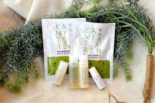 a group of three products sitting on top of a plant at Hotel Shinanoji in Nagano