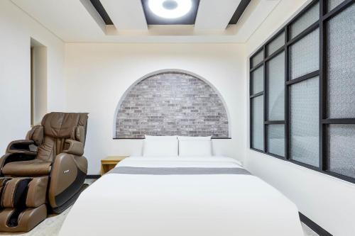 Posteľ alebo postele v izbe v ubytovaní Hoengseong Haru Self check-in Hotel