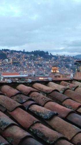a view of a city from the roof of a building at Mundo Viajero Saphy in Cusco