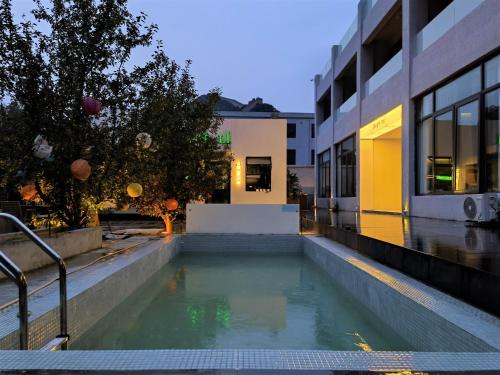 Πισίνα στο ή κοντά στο Delight Inn