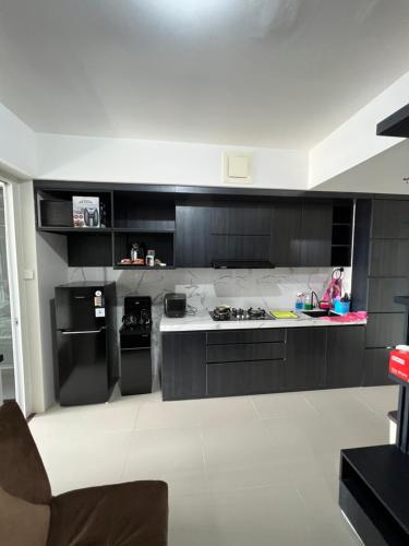 Dapur atau dapur kecil di Apartment Breeze Bintaro, Tangerang Selatan